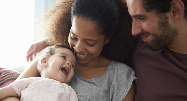 family holding baby